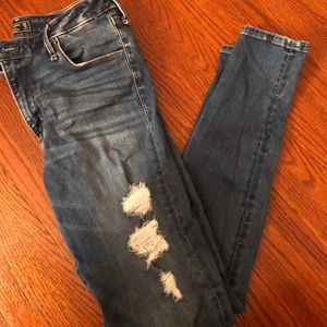 High waisted distressed skinny jeans